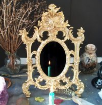 венецианское зеркало и отражение свечи, фото